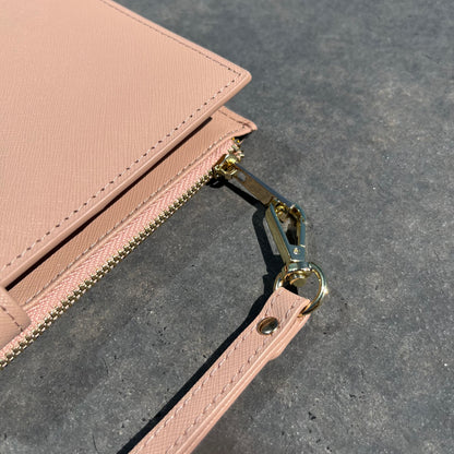 LYUNA. Ultimate Travel Wallet with Features a gold hardware zip